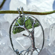 Genuine 2.32 g transparent green Moldavite tree pendant from Chlum, Czech Republic, handcrafted with copper and lead-free jewellery tin with silver admixture.