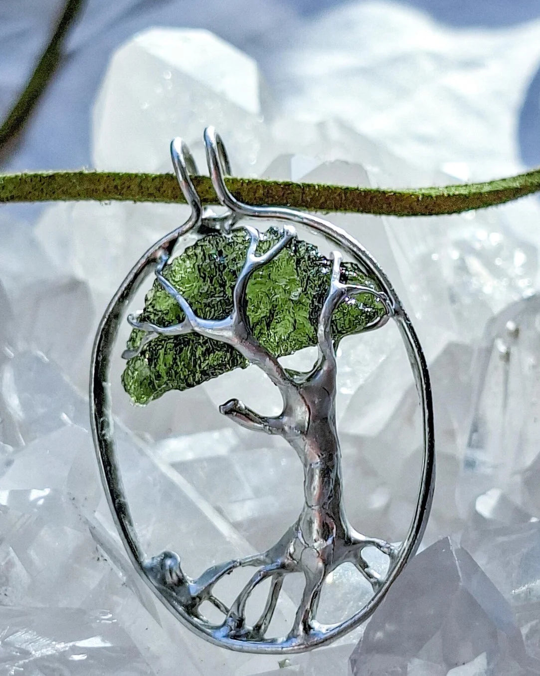 Genuine 2.32 g transparent green Moldavite tree pendant from Chlum, Czech Republic, handcrafted with copper and lead-free jewellery tin with silver admixture.