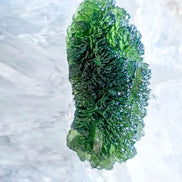 Large 20.74g pure green Moldavite from Nesměň les, Czech Republic with natural deep spiked sculpting