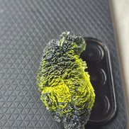 Large 20.74g pure green Moldavite from Nesměň les, Czech Republic with natural deep spiked sculpting