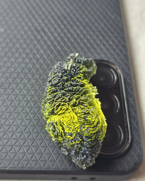 Large 20.74g pure green Moldavite from Nesměň les, Czech Republic with natural deep spiked sculpting