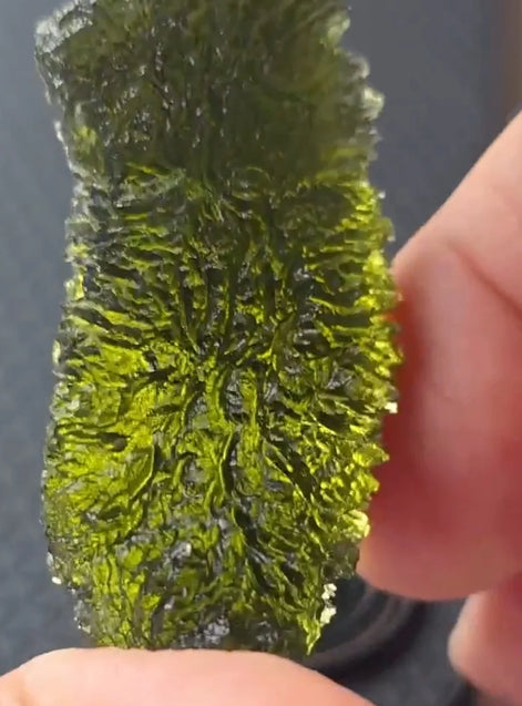 Large 20.74g pure green Moldavite from Nesměň les, Czech Republic with natural deep spiked sculpting