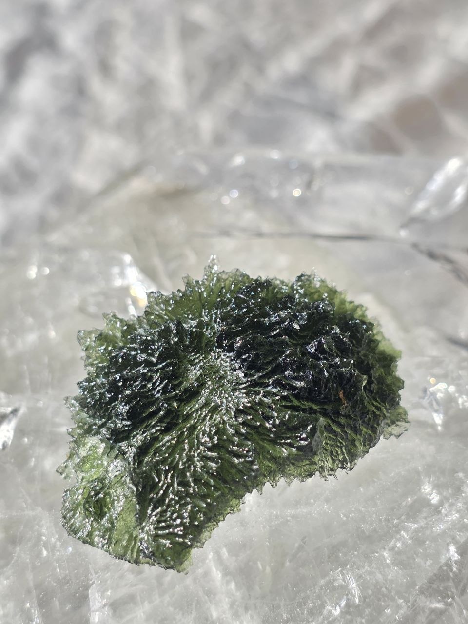 Large 25.16g natural green Moldavite from Malý Chlum, Czech Republic with deep sculpted surface