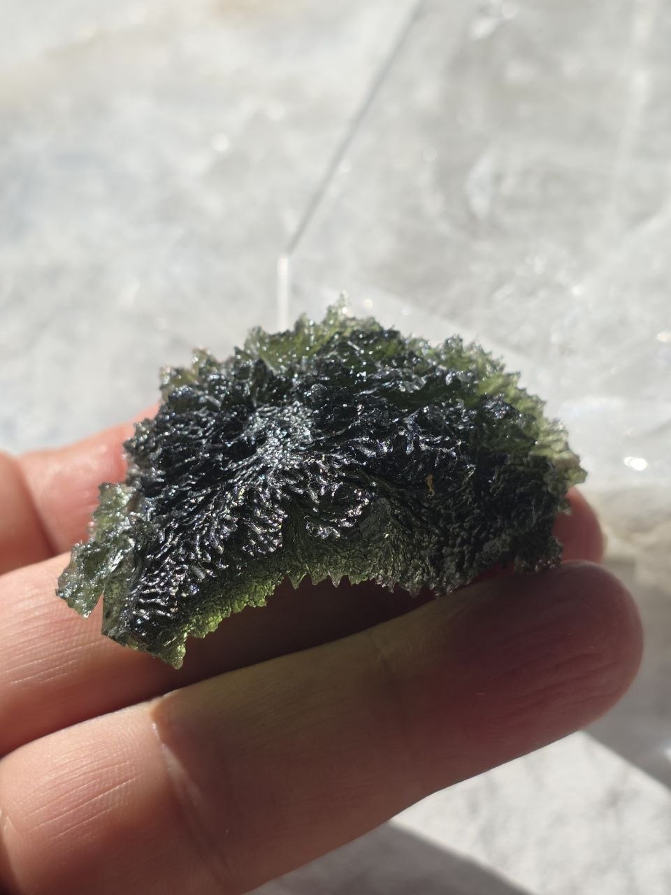 Large 25.16g natural green Moldavite from Malý Chlum, Czech Republic with deep sculpted surface