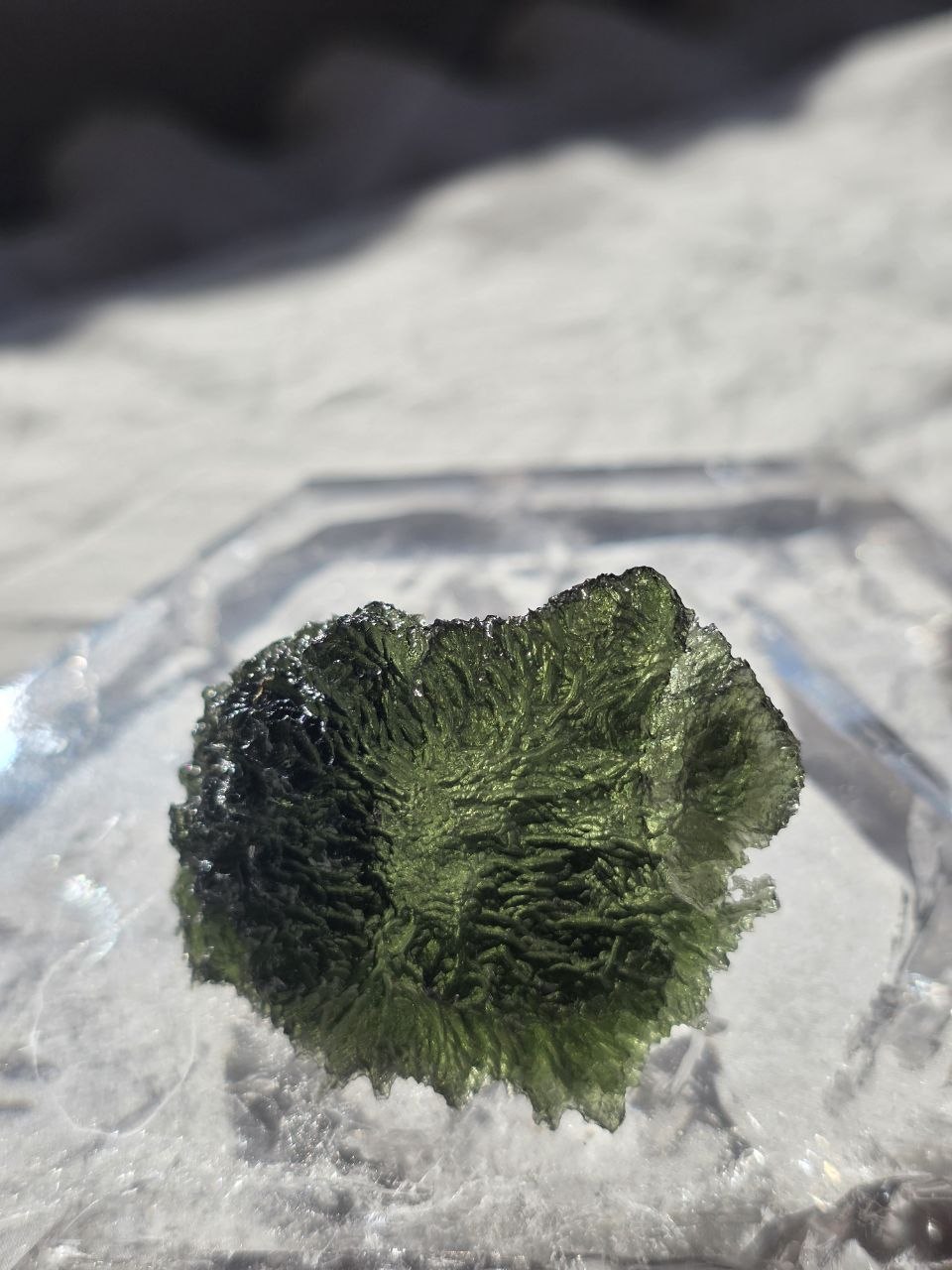 Large 25.16g natural green Moldavite from Malý Chlum, Czech Republic with deep sculpted surface