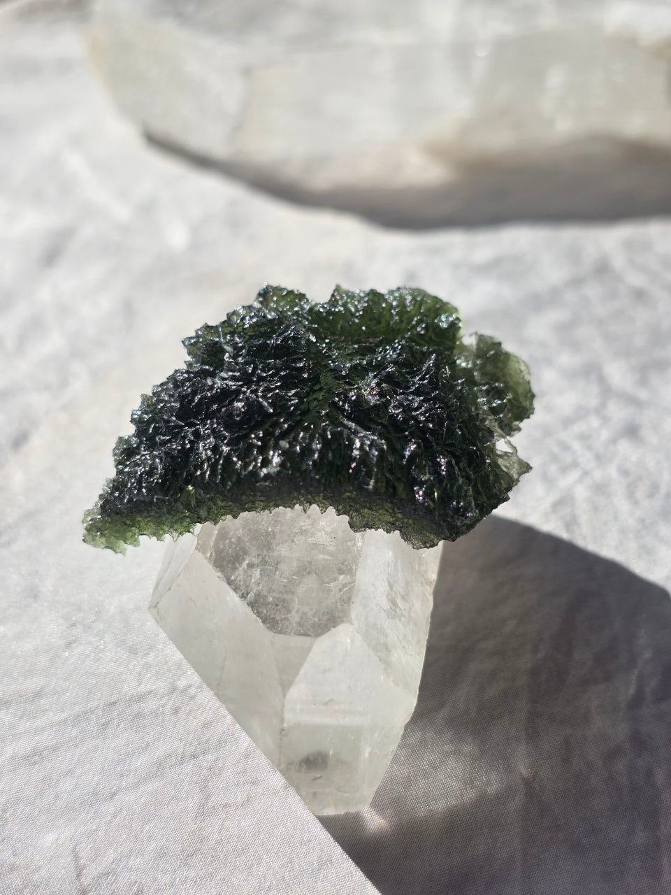 Large 25.16g natural green Moldavite from Malý Chlum, Czech Republic with deep sculpted surface