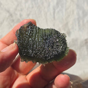 Large 25.16g natural green Moldavite from Malý Chlum, Czech Republic with deep sculpted surface