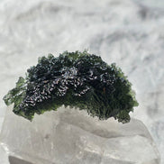 Large 25.16g natural green Moldavite from Malý Chlum, Czech Republic with deep sculpted surface
