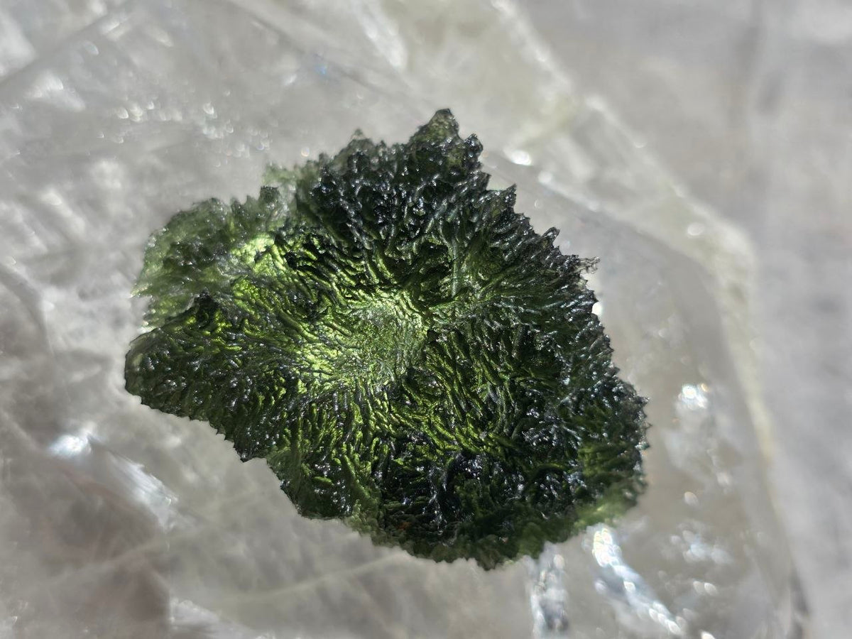 Large 25.16g natural green Moldavite from Malý Chlum, Czech Republic with deep sculpted surface