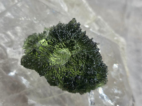 Large 25.16g natural green Moldavite from Malý Chlum, Czech Republic with deep sculpted surface