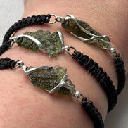 Moldavite bracelet with 1.2g transparent stone from Chlum on black braided cord