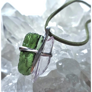 Pendant with 3.49g apple green moldavite from Ločenice and pale pink kunzite held by crossing metal bands.