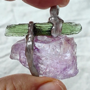 Handcrafted pendant with a 1.08g transparent green Moldavite from Chlum and Amethyst in a lead-free tin alloy setting with copper wire.