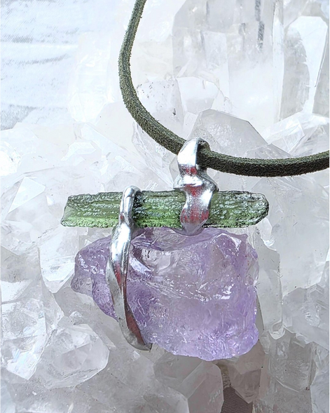 Handcrafted pendant with a 1.08g transparent green Moldavite from Chlum and Amethyst in a lead-free tin alloy setting with copper wire.