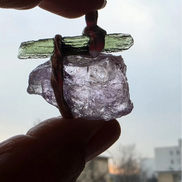 Handcrafted pendant with a 1.08g transparent green Moldavite from Chlum and Amethyst in a lead-free tin alloy setting with copper wire.