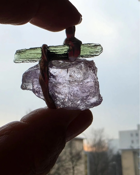 Handcrafted pendant with a 1.08g transparent green Moldavite from Chlum and Amethyst in a lead-free tin alloy setting with copper wire.