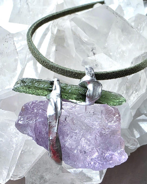 Handcrafted pendant with a 1.08g transparent green Moldavite from Chlum and Amethyst in a lead-free tin alloy setting with copper wire.