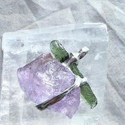 Handcrafted pendant with a 1.08g transparent green Moldavite from Chlum and Amethyst in a lead-free tin alloy setting with copper wire.