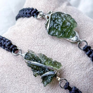 Moldavite bracelet with 1.2g transparent stone from Chlum on black braided cord