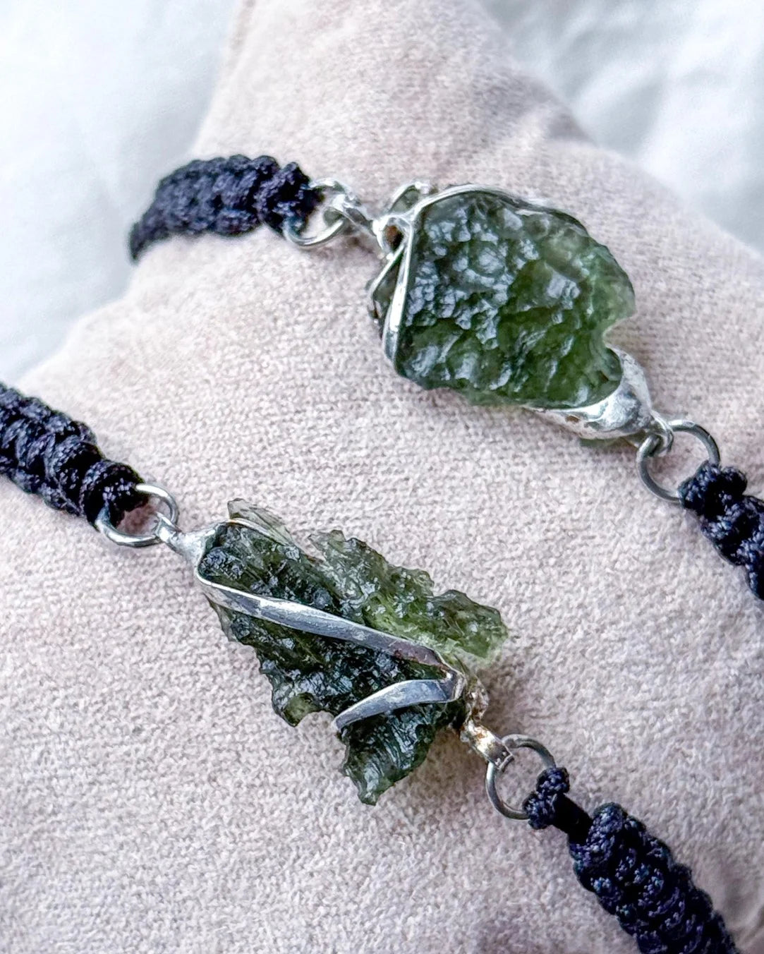 Moldavite bracelet with 1.2g transparent stone from Chlum on black braided cord