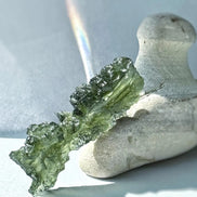 Natural green Ježkovna moldavite from Besednice, 3.9g, with a sculpted surface
