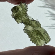Natural green Ježkovna moldavite from Besednice, 3.9g, with a sculpted surface