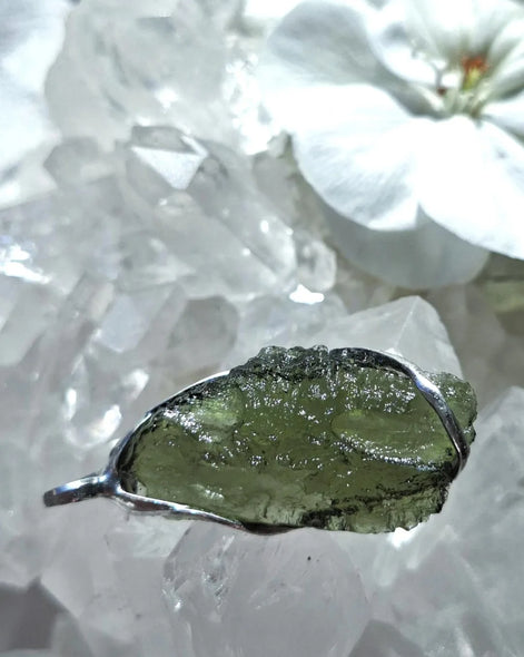 Transparent green Chlum Moldavite pendant in an open handcrafted setting